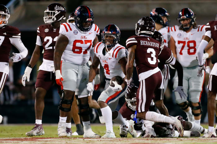 Ole Miss Rebels running back Quinshon Judkins celebrates a first down vs. the Mississippi State Bulldogs in the 2023 Egg Bowl.